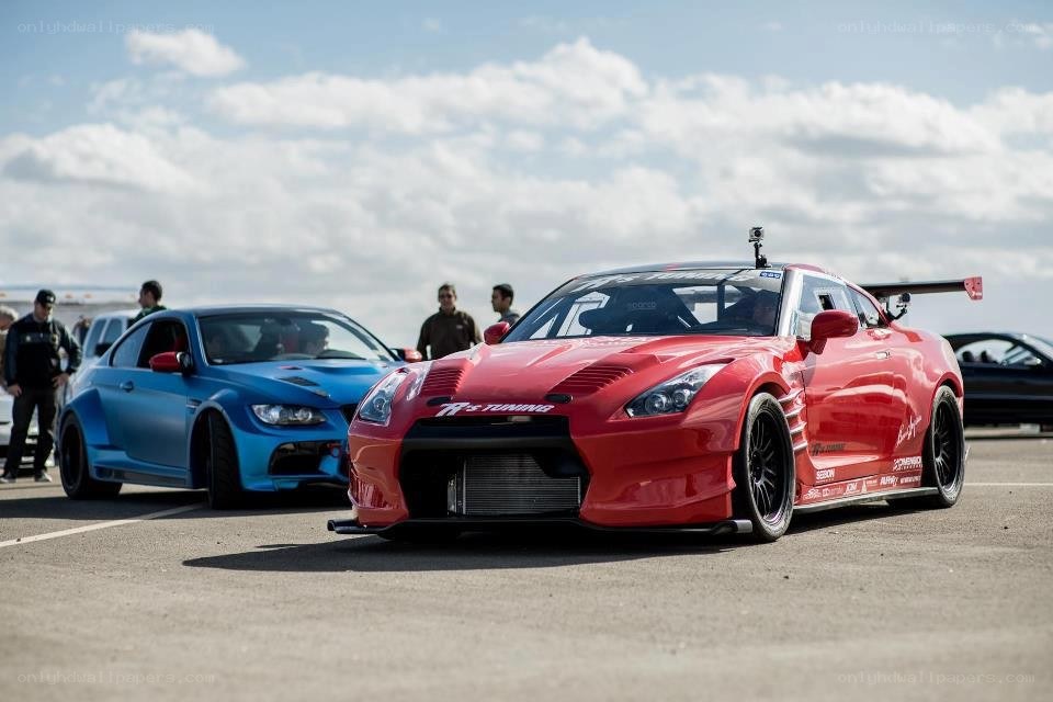 Red race car on track