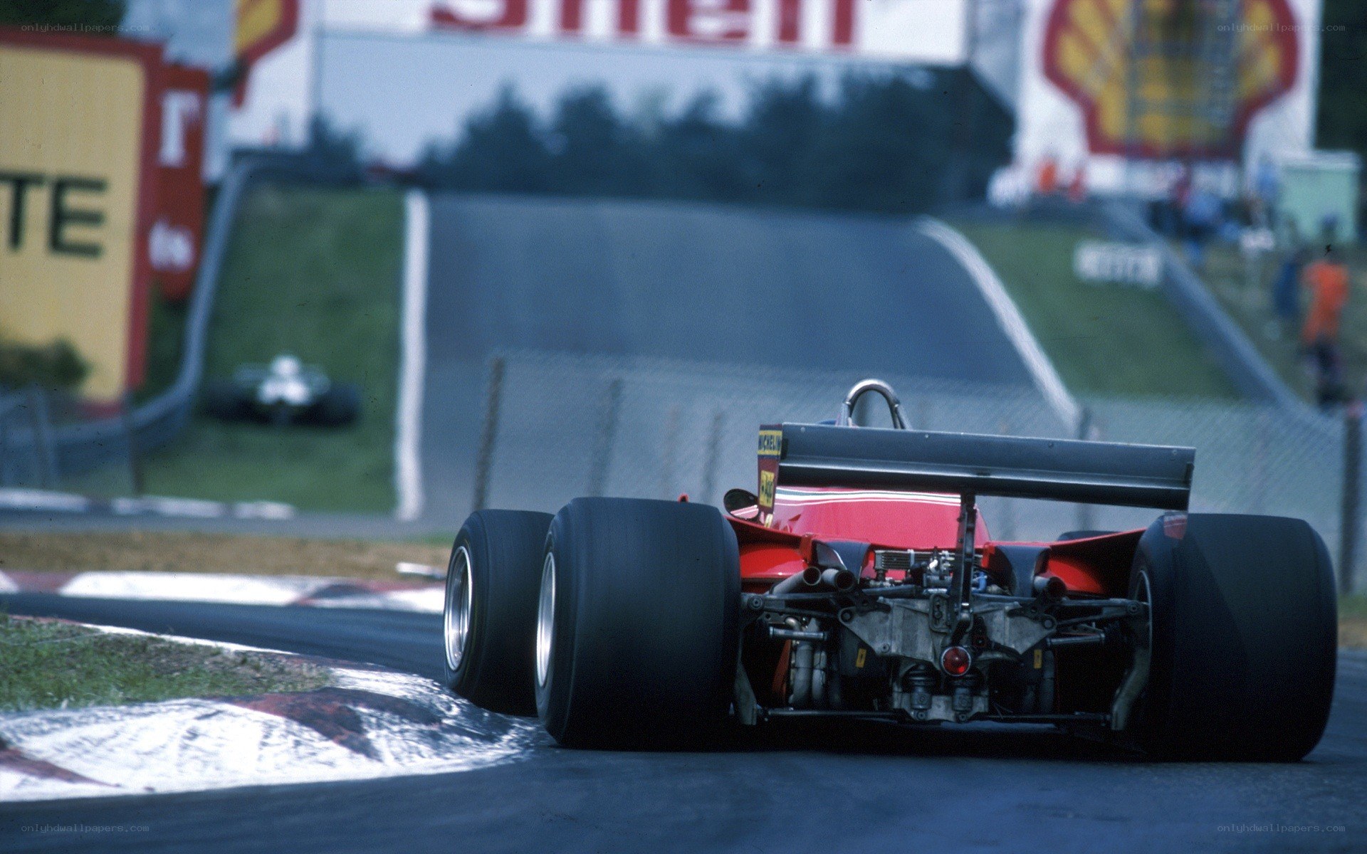 Red race car on track