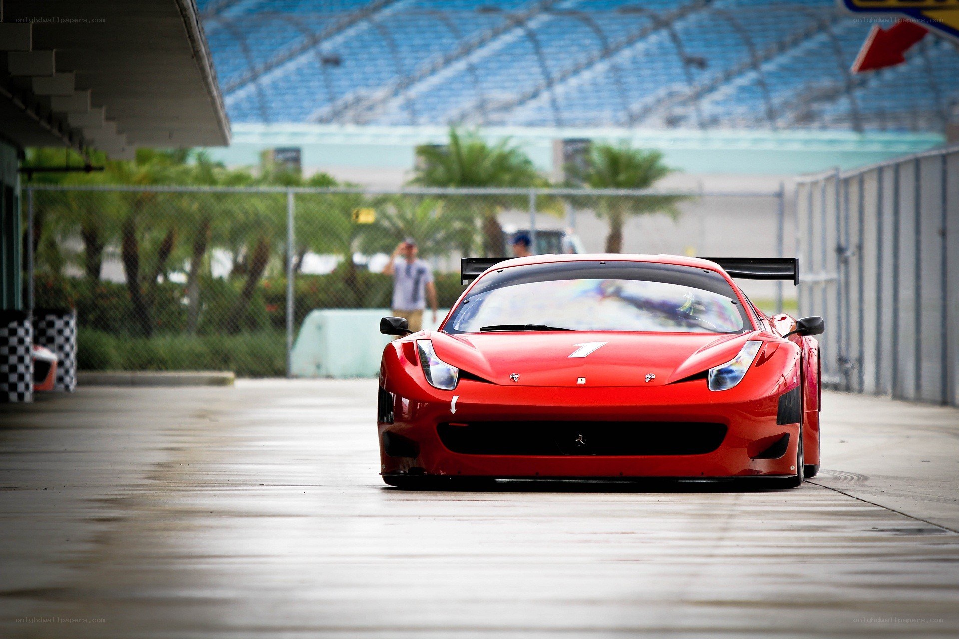 Red race car on track