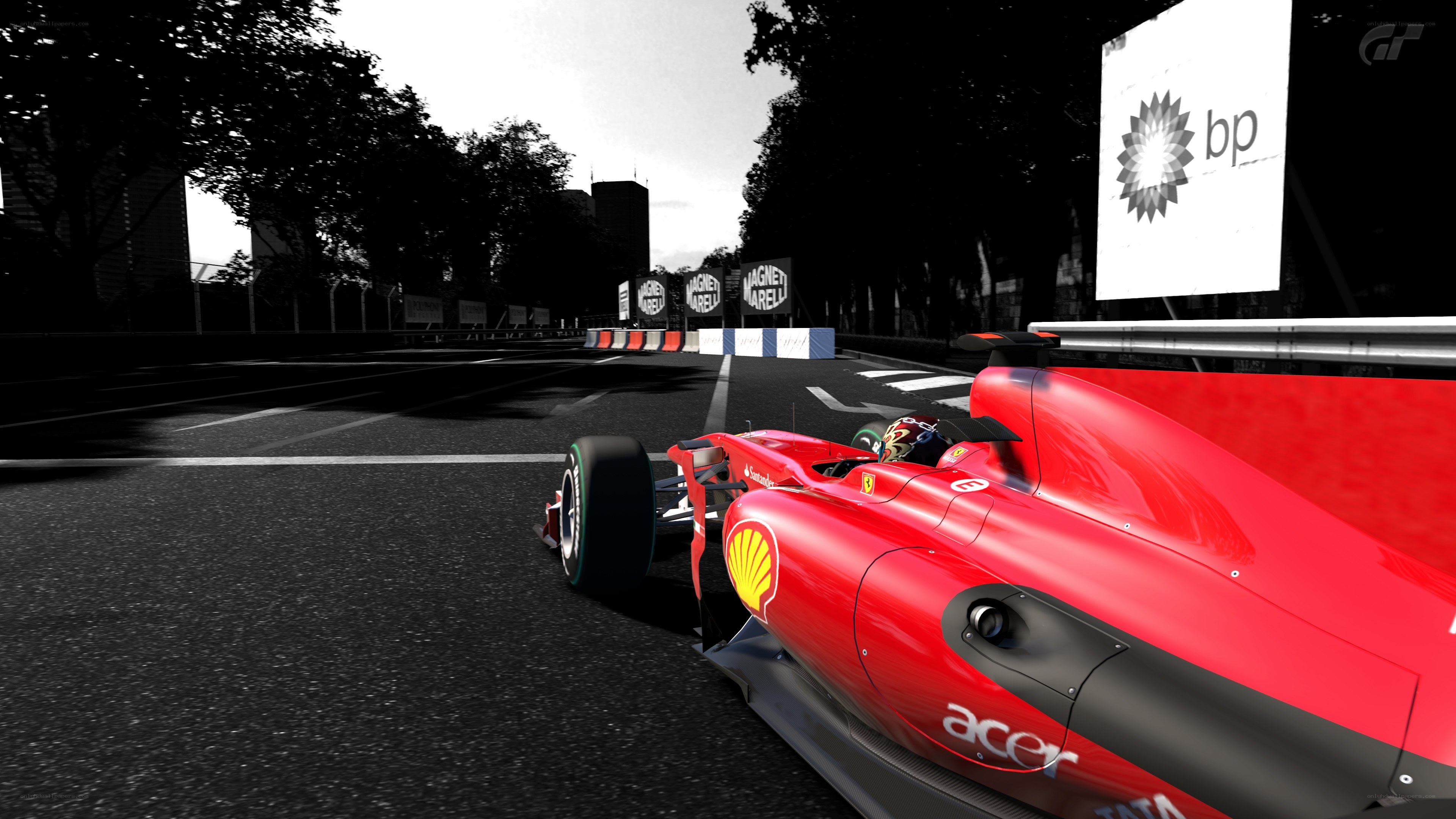Red race car on track