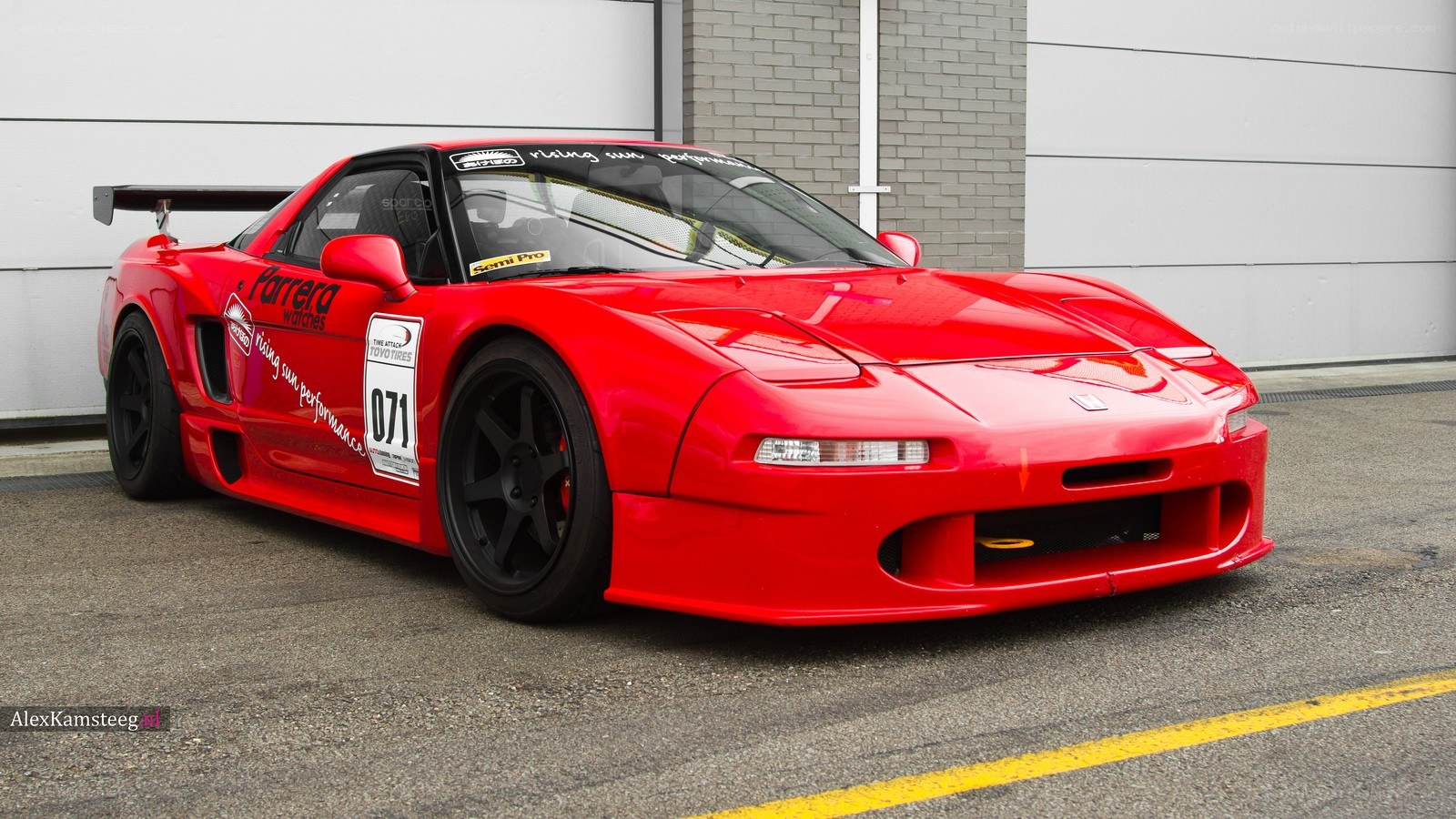 red race car on track