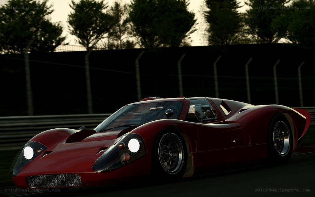 Red race car on track