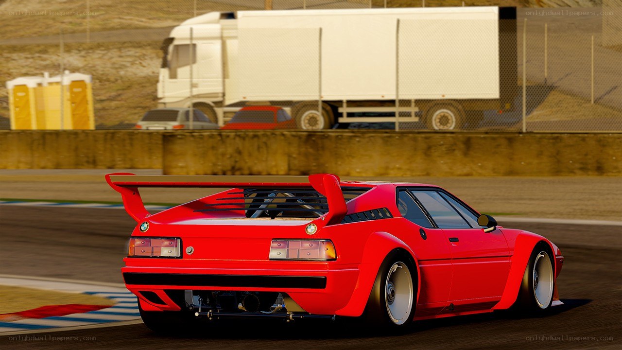 Red race car on track
