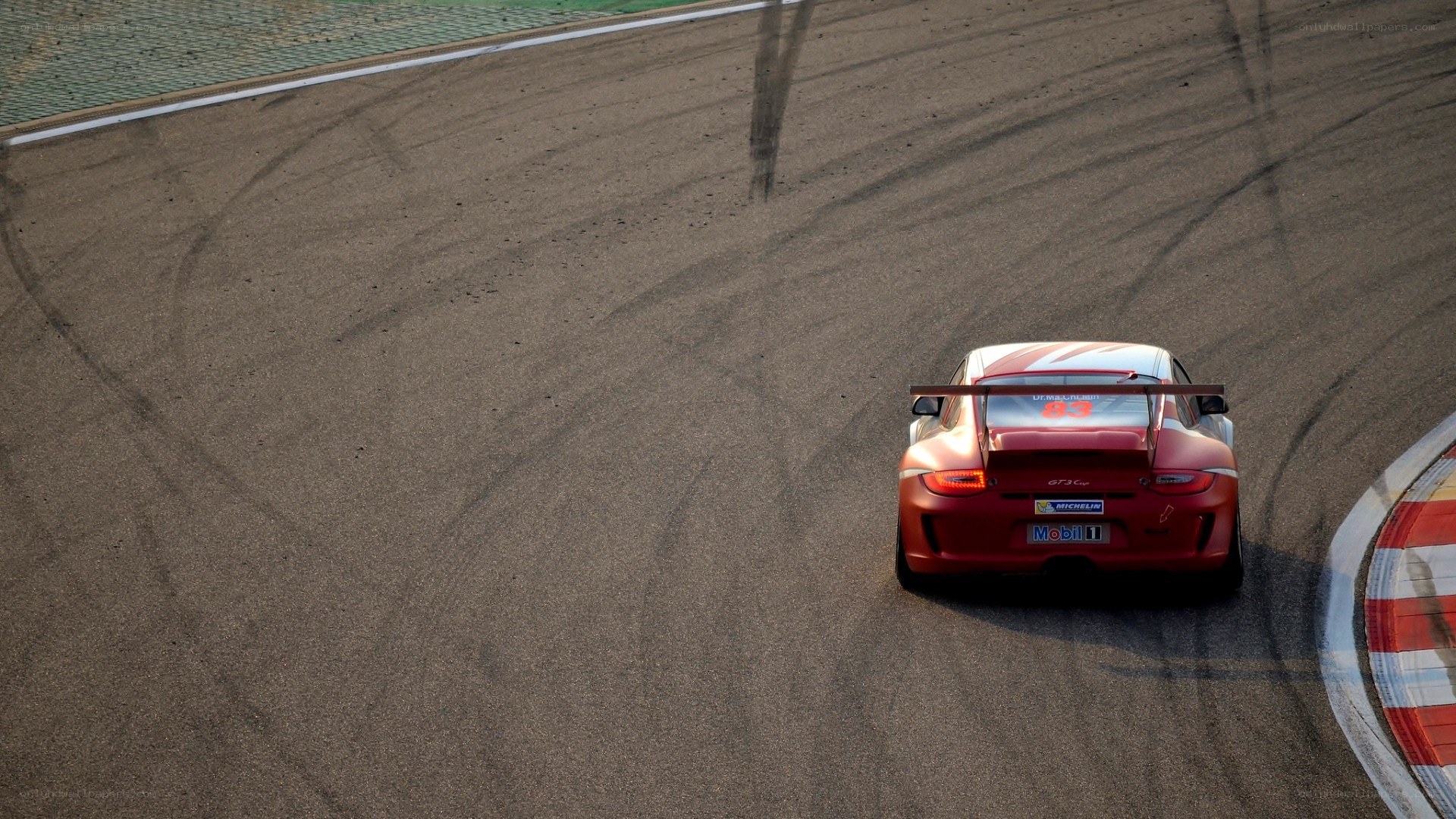 red race car on track