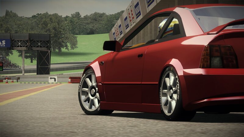 red race car on track