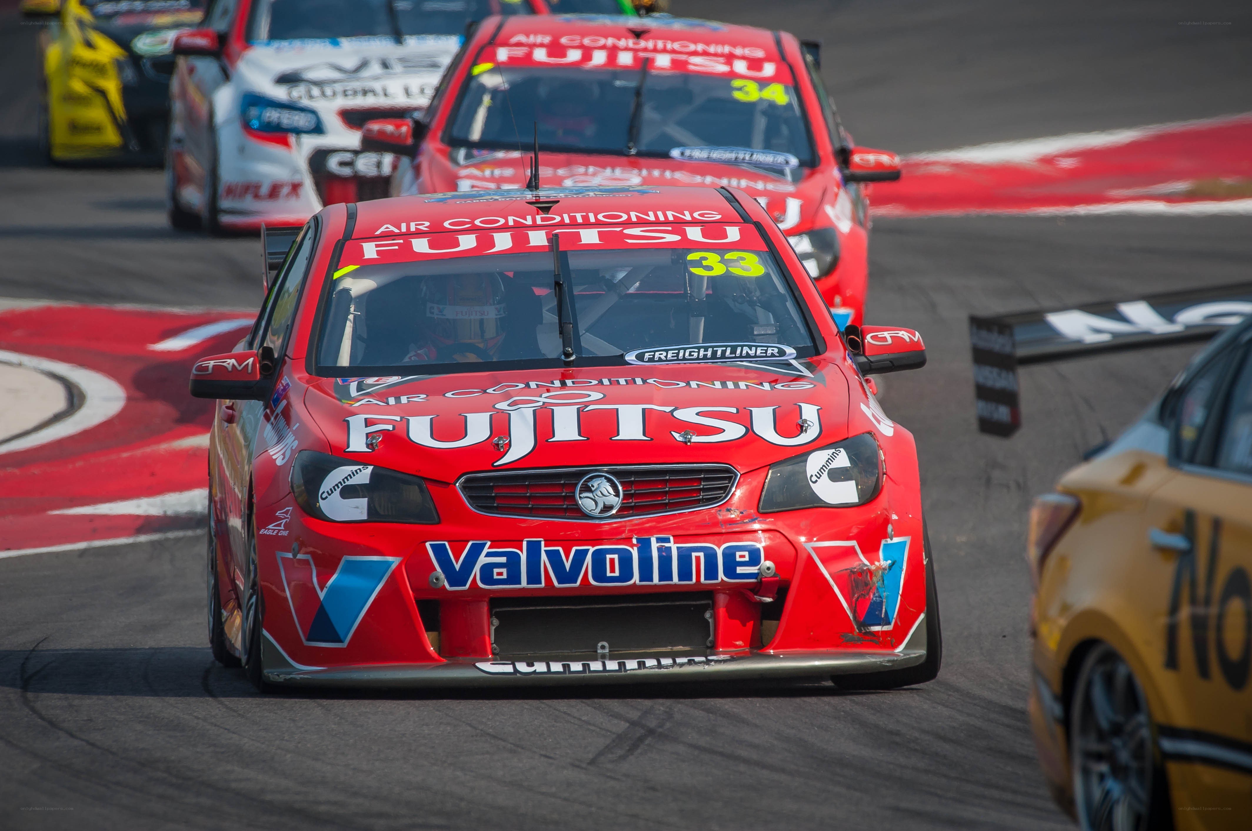 Red race car on track