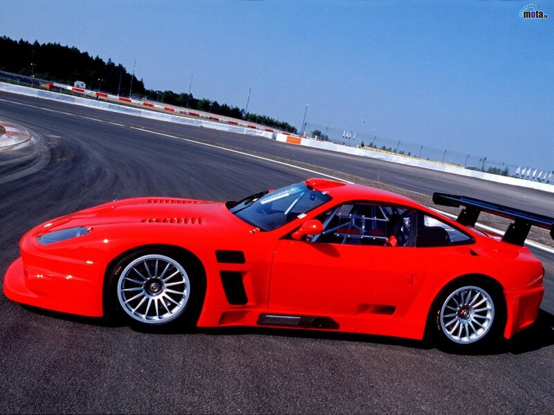 Red race car on track
