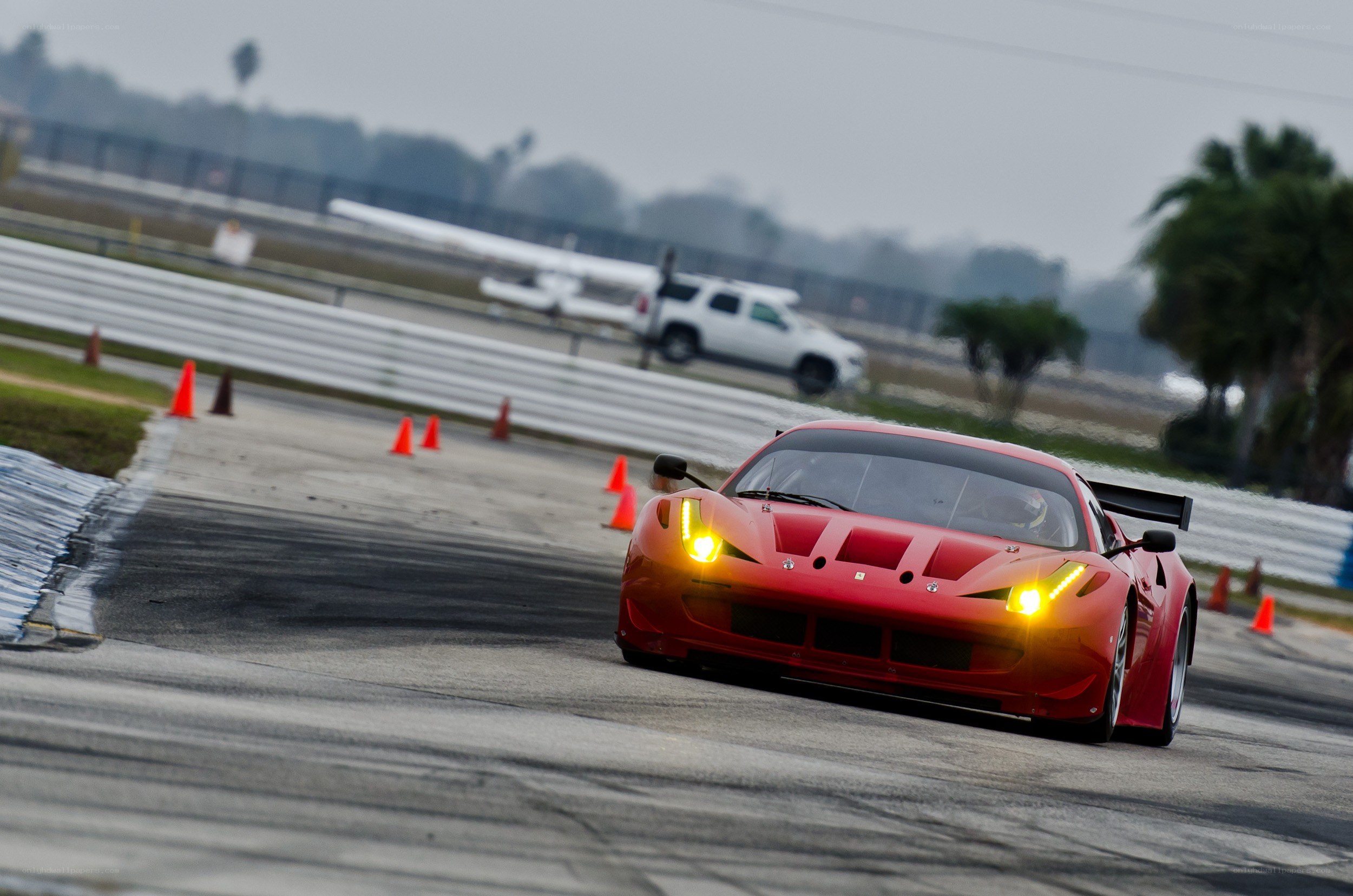 Red race car on track
