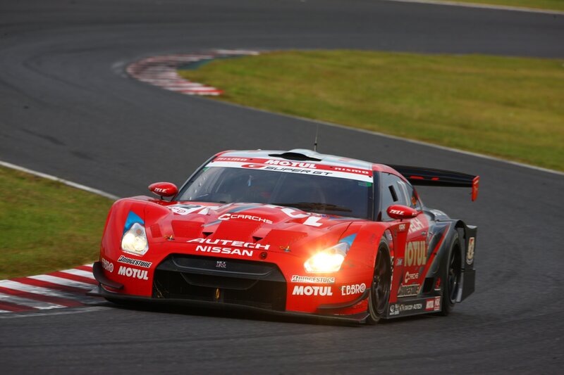 red race car on track