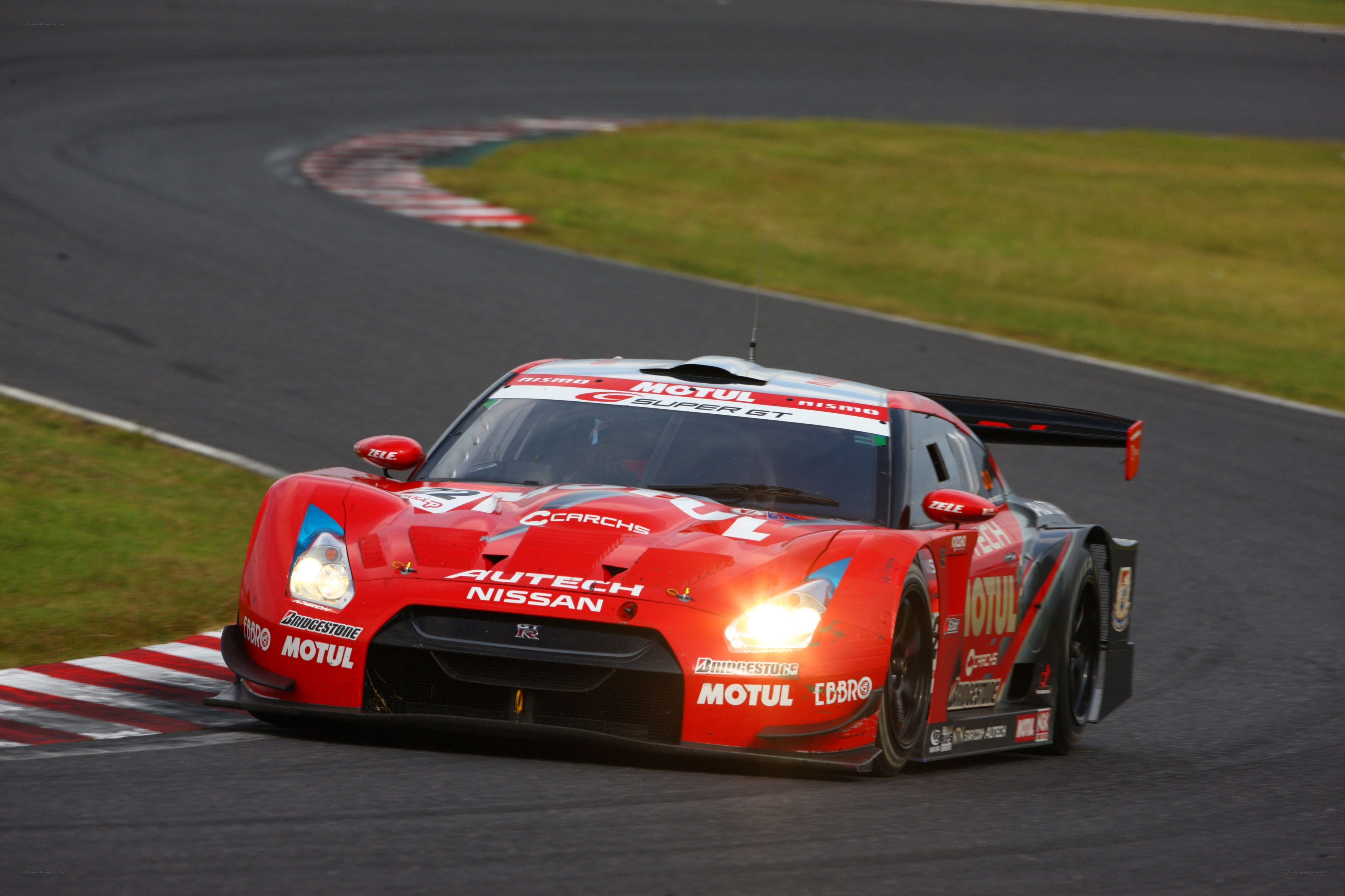 red race car on track