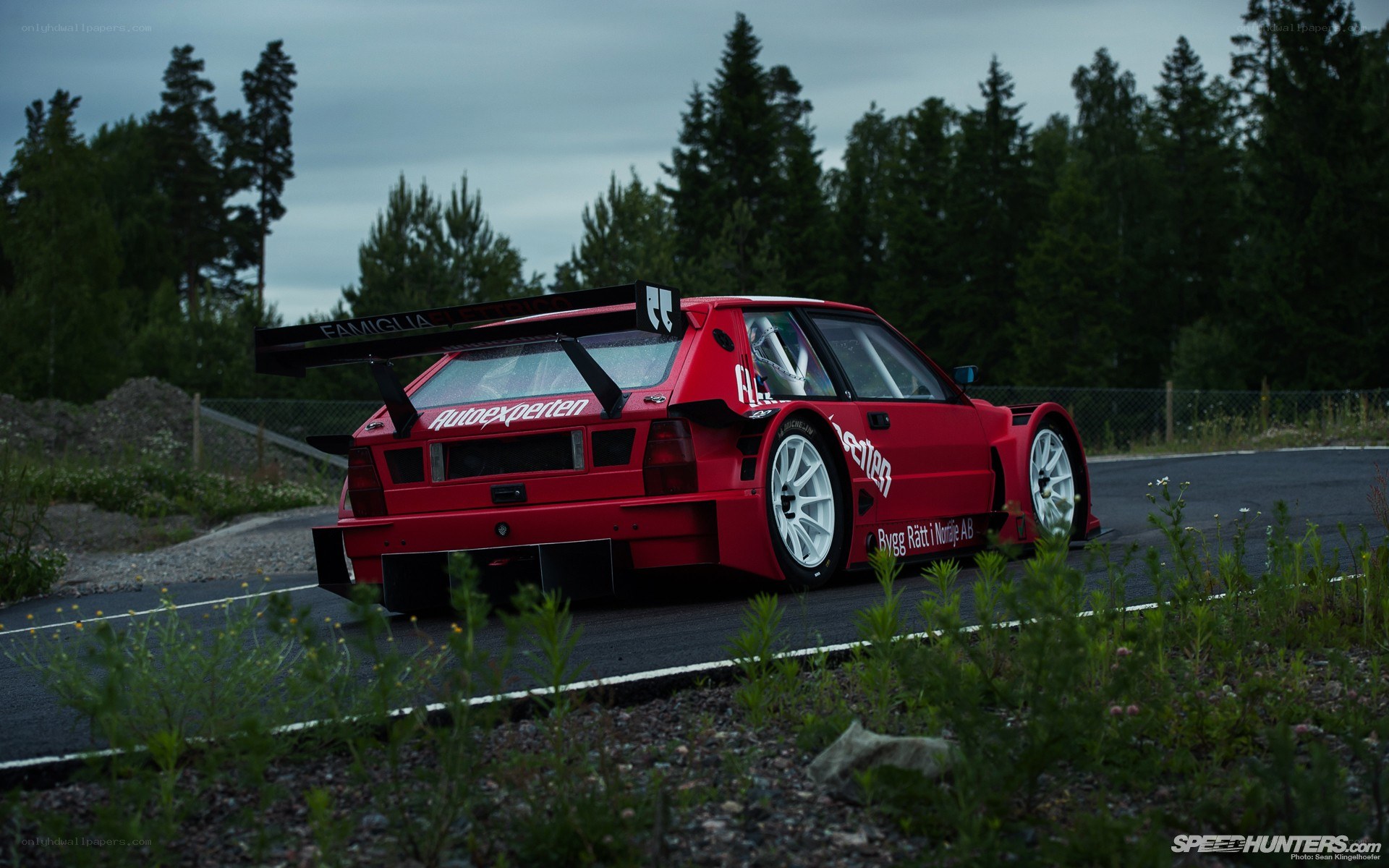 red race car on track
