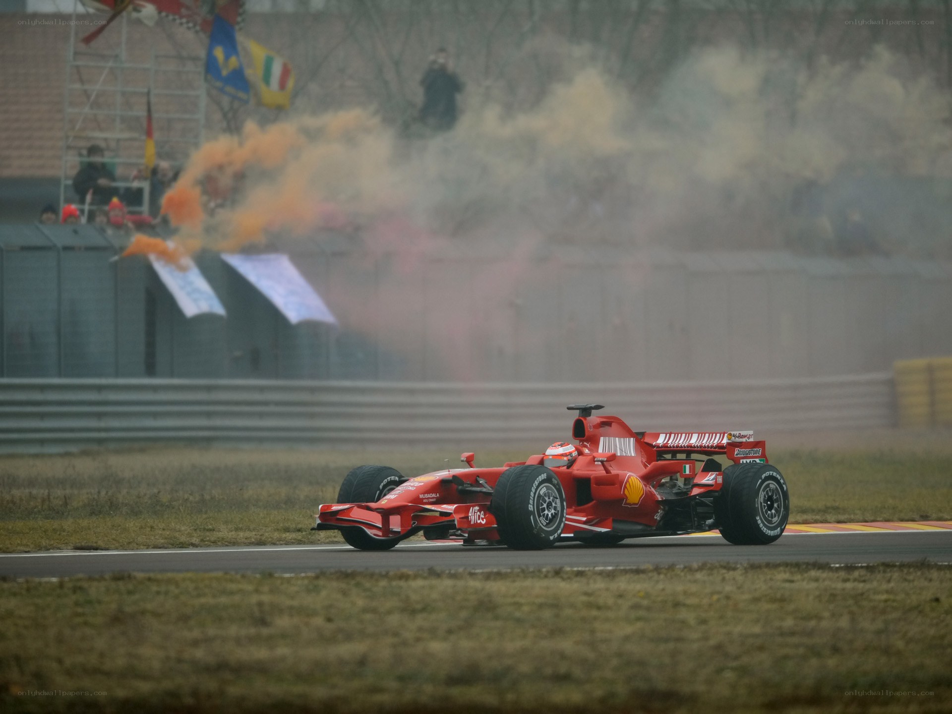 Red race car on track