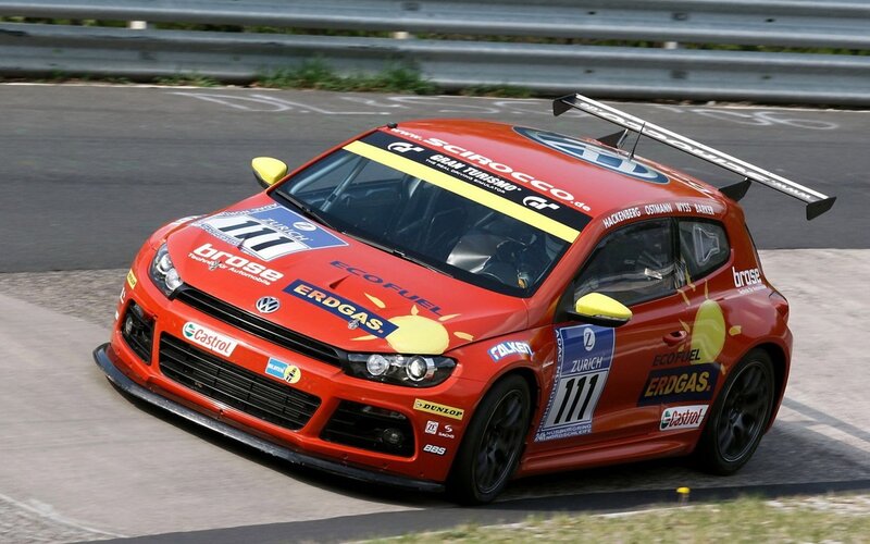 Red race car on track