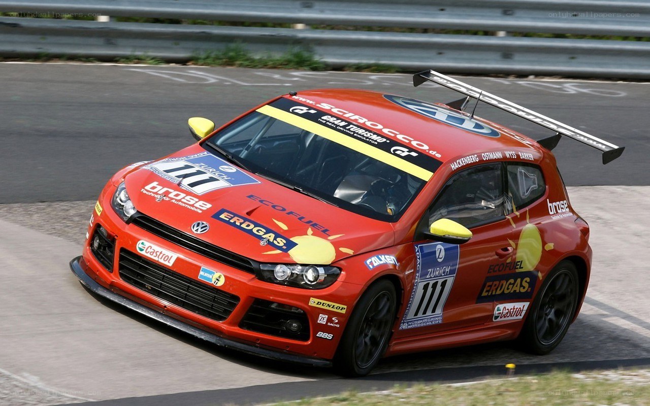 Red race car on track