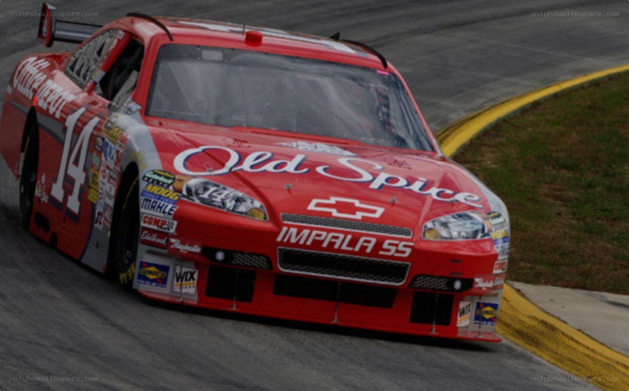 Red race car on track