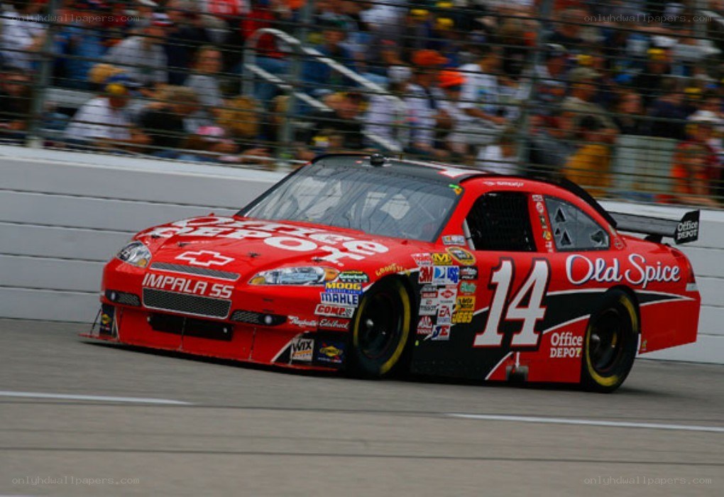 Red race car on track