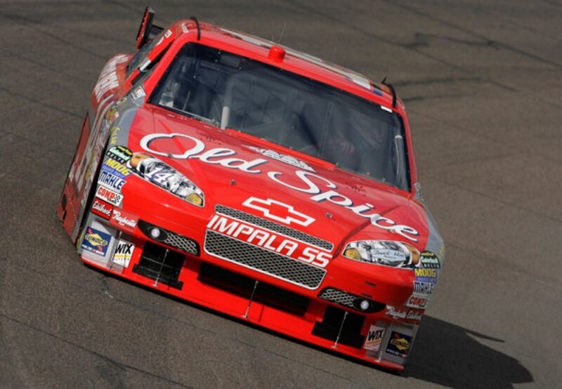 Red race car on track
