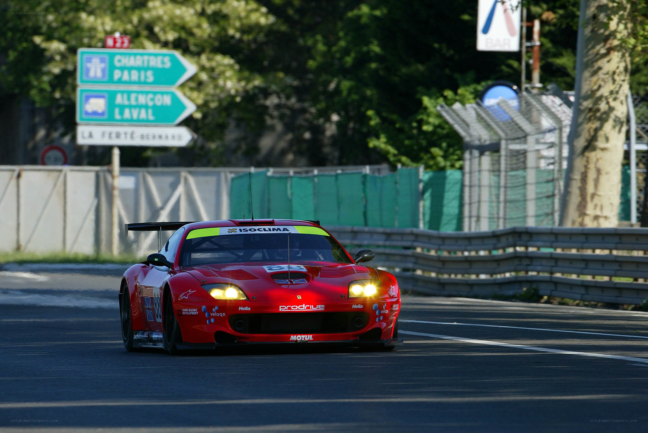 Red race car on track