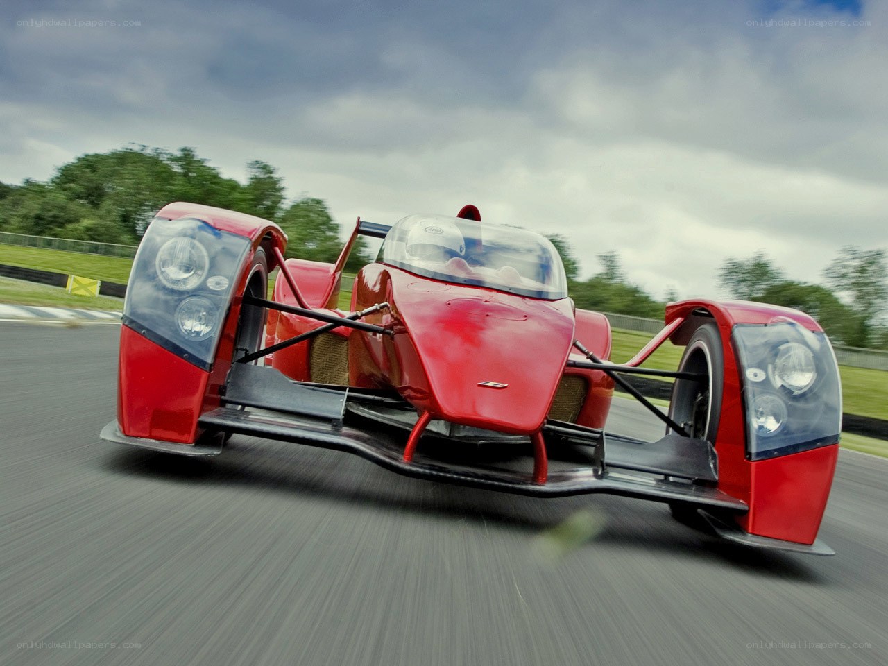 Red race car on track
