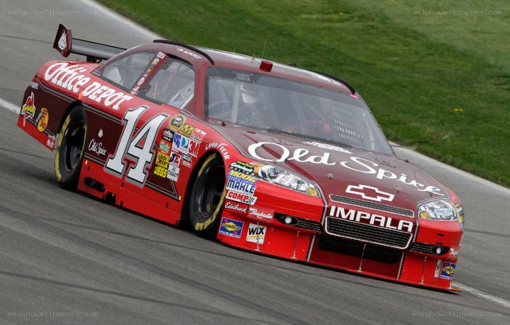 Red race car on track