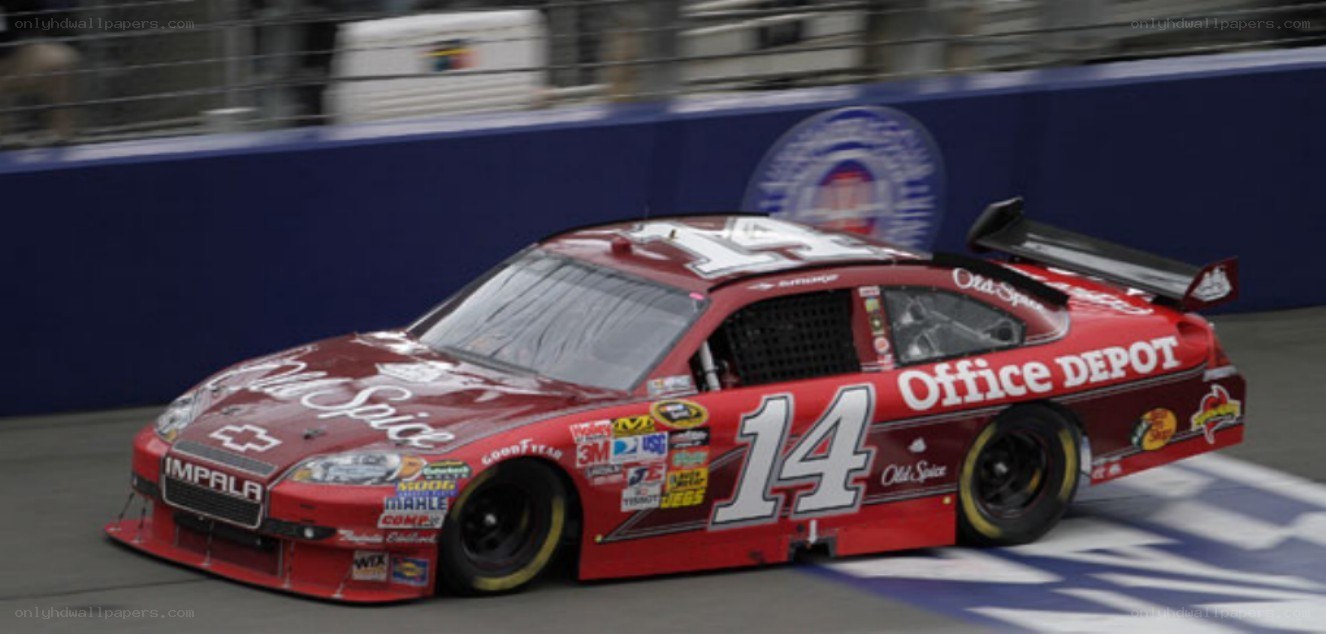 Red race car on track