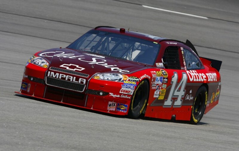 Red race car on track
