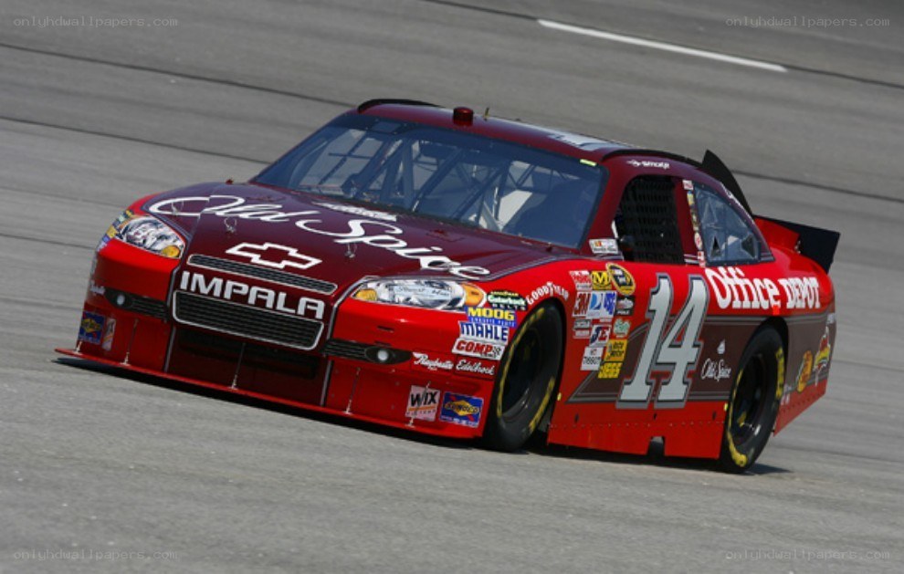 Red race car on track