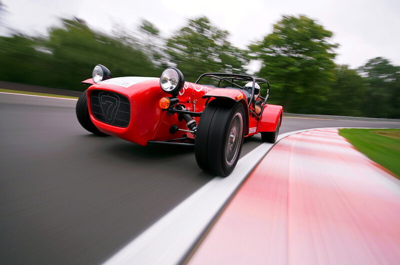 Red race car on track