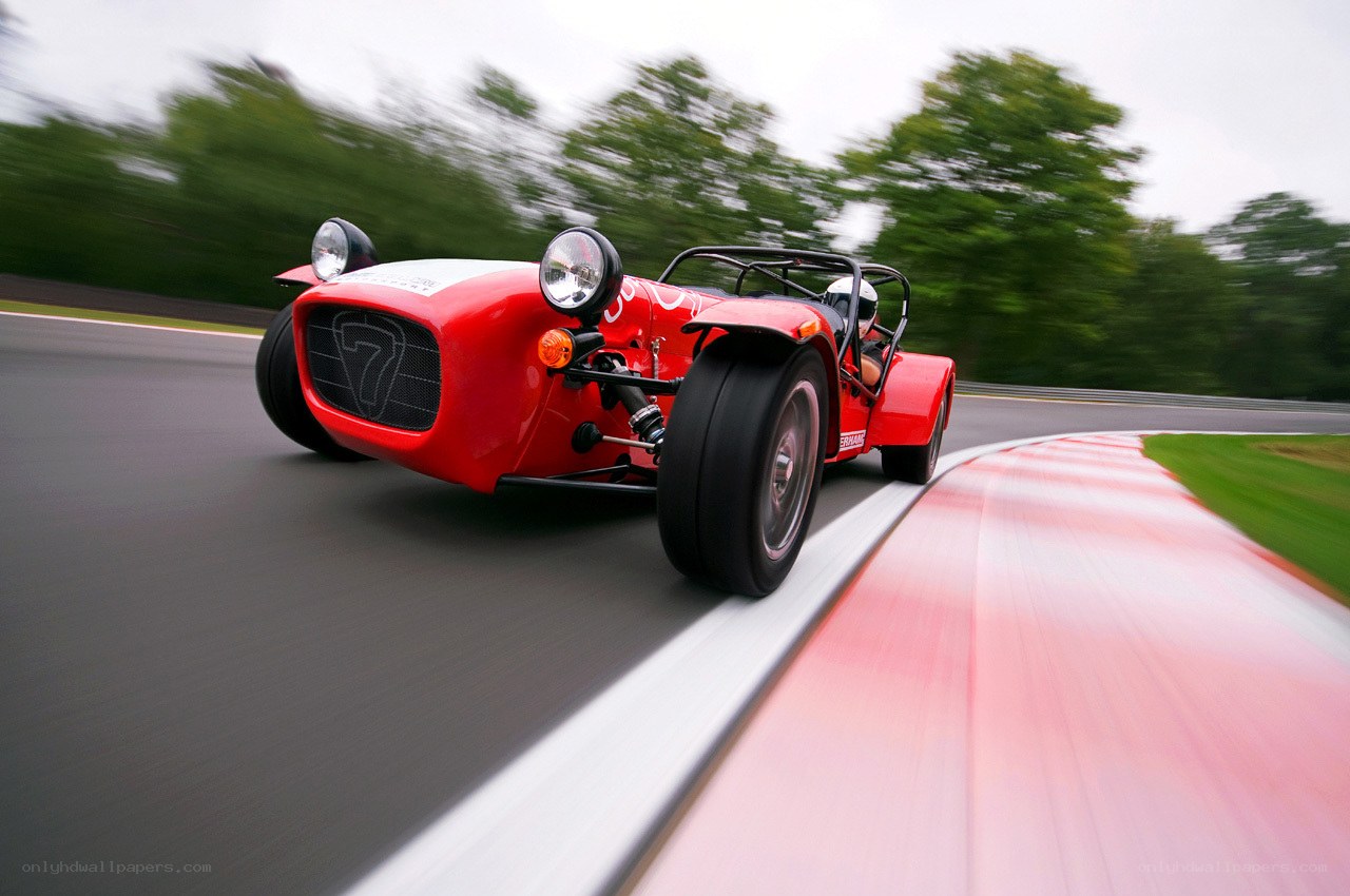 Red race car on track