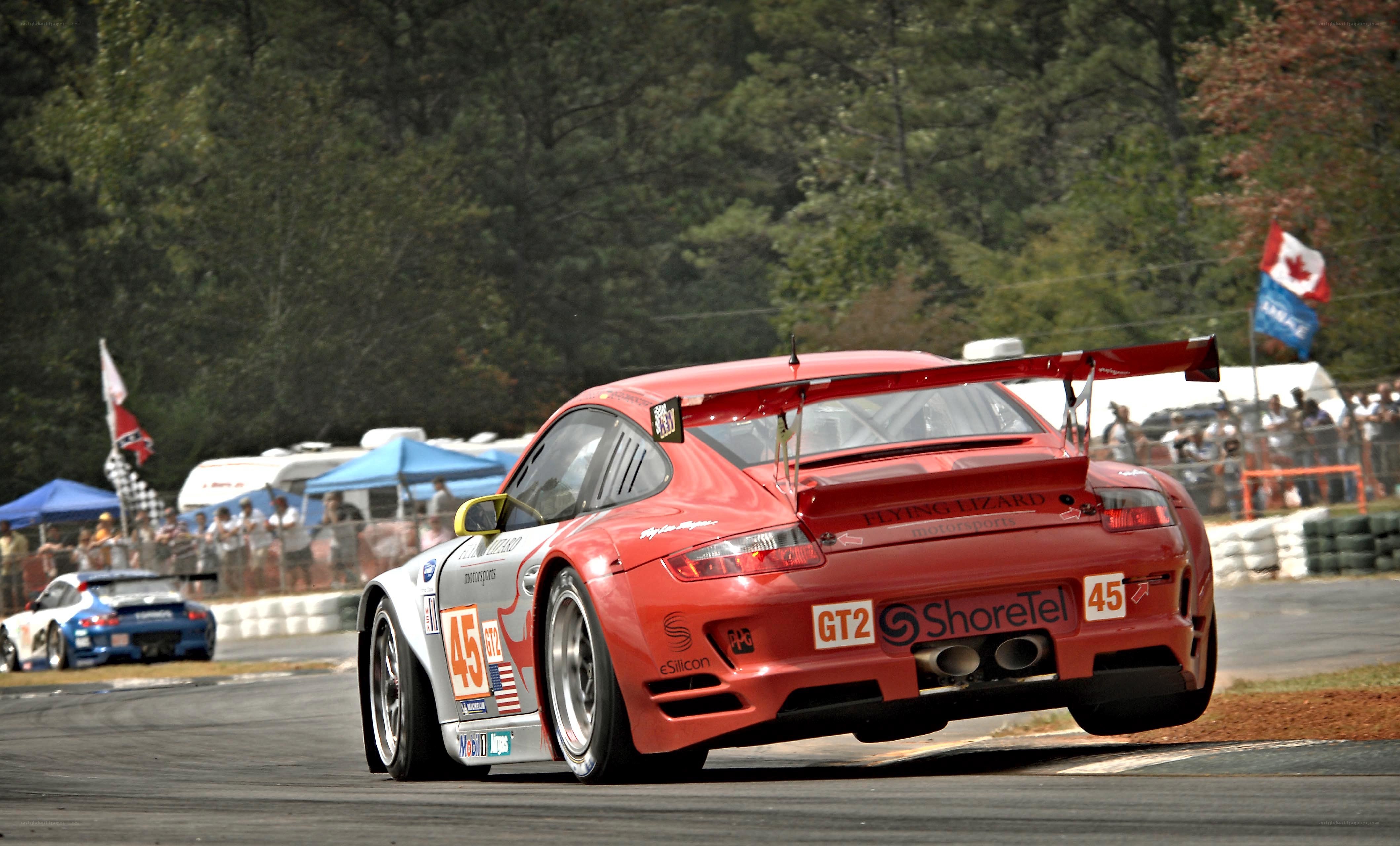 Red race car on track