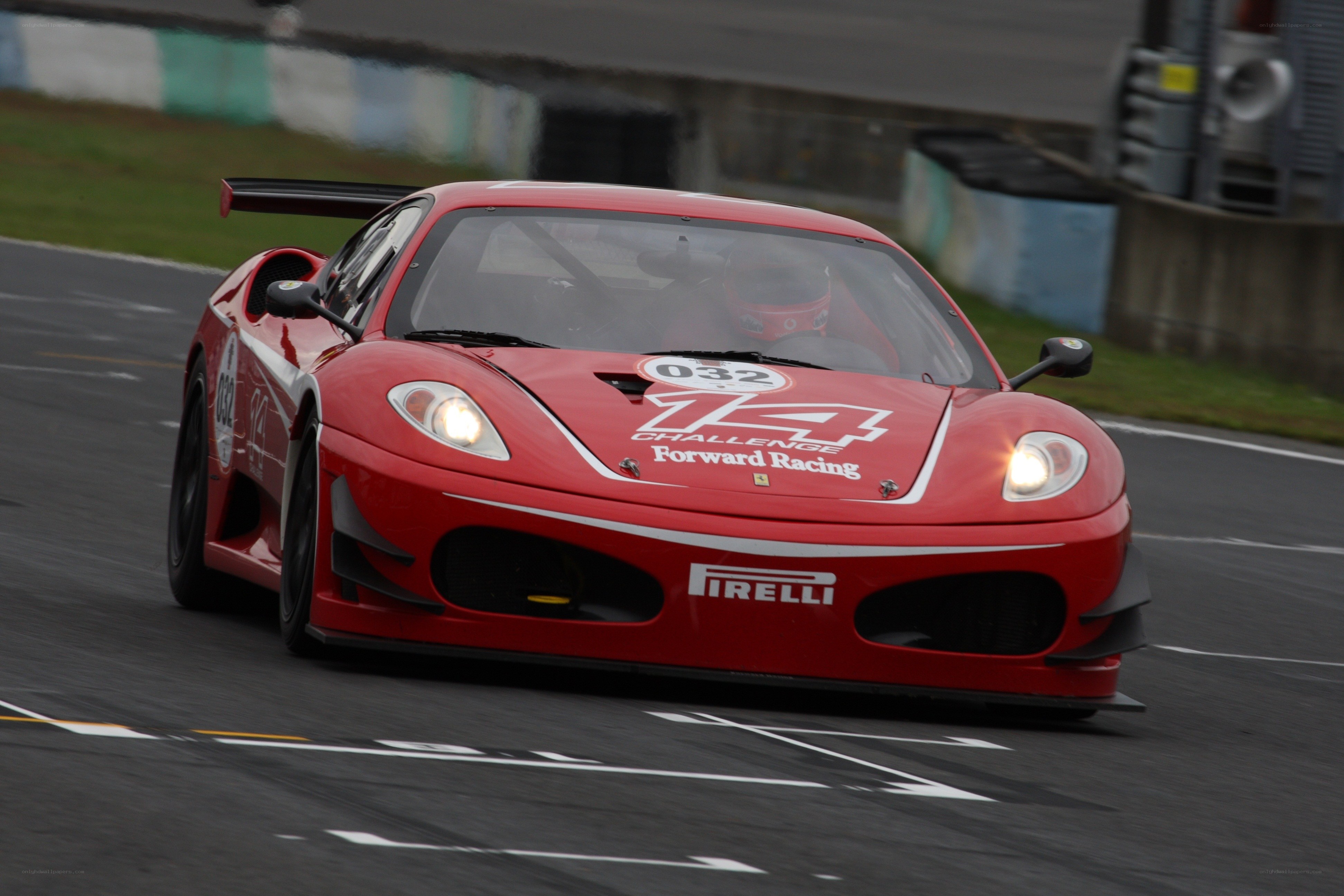 Red race car on track