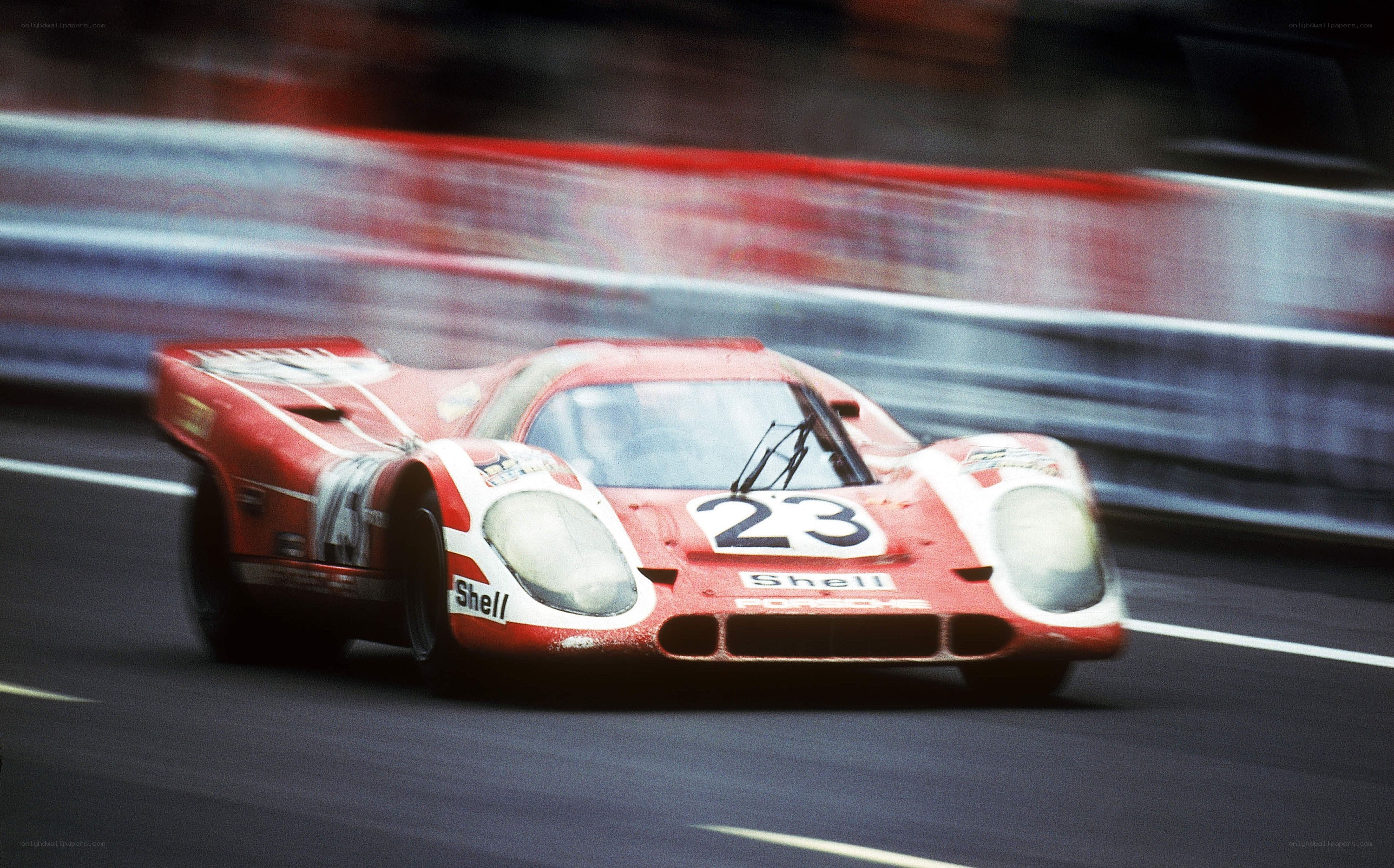 Red race car on track