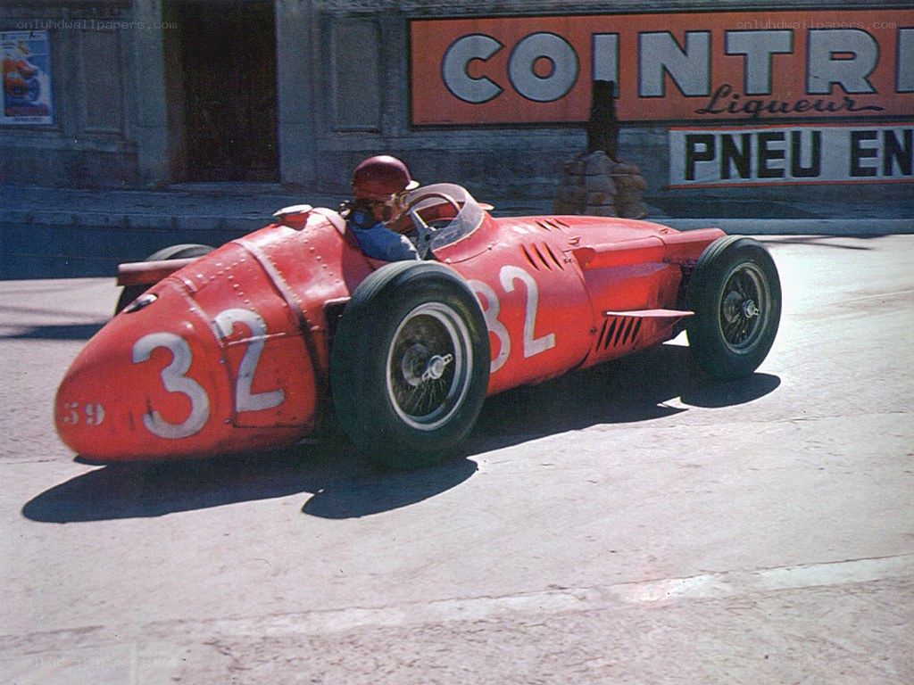 Red race car on track