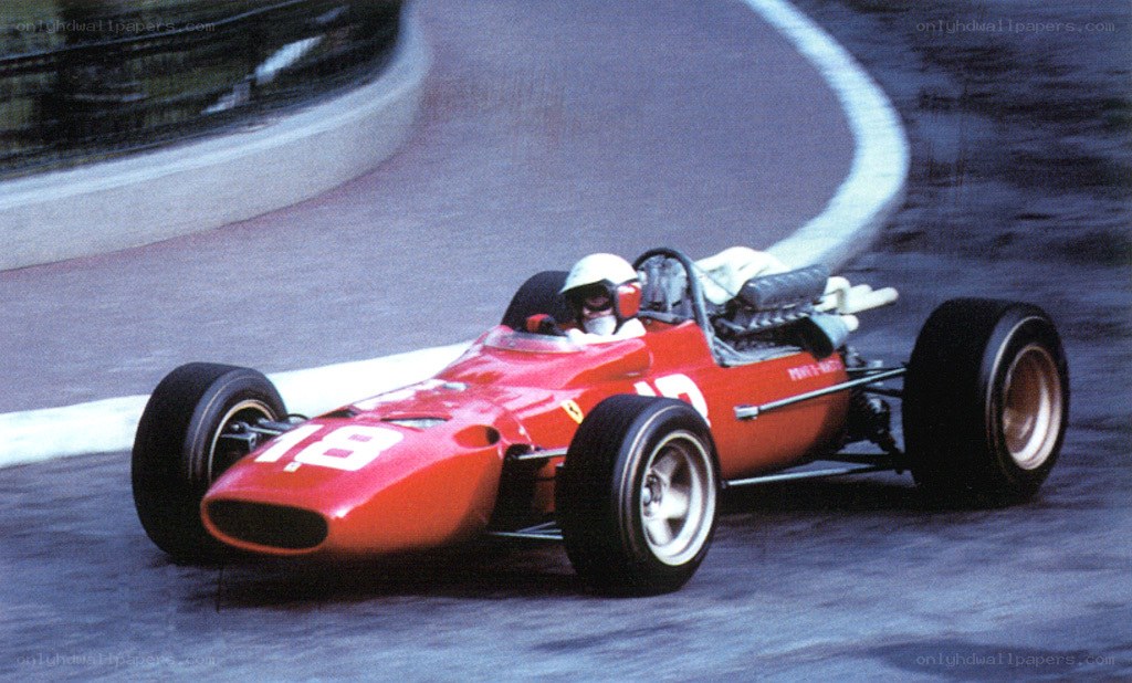 Red race car on track
