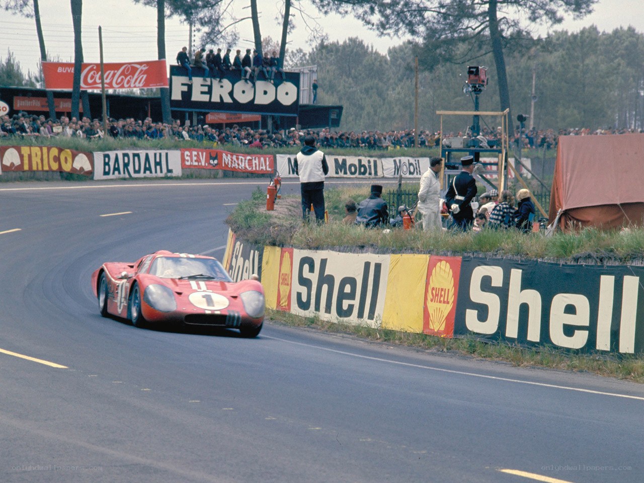 Red race car on track