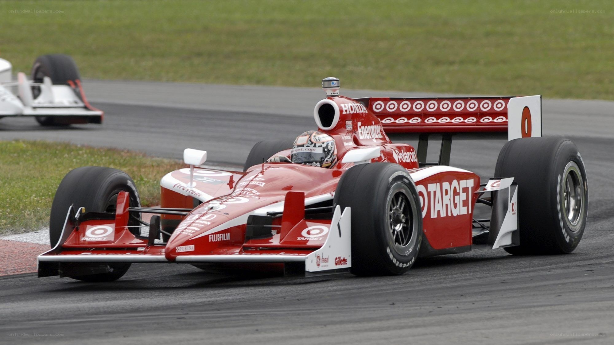 Red race car on track