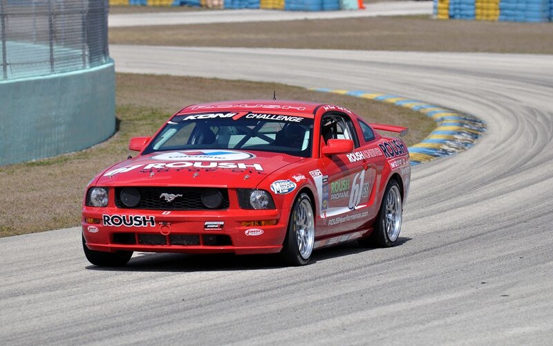 Red race car on track