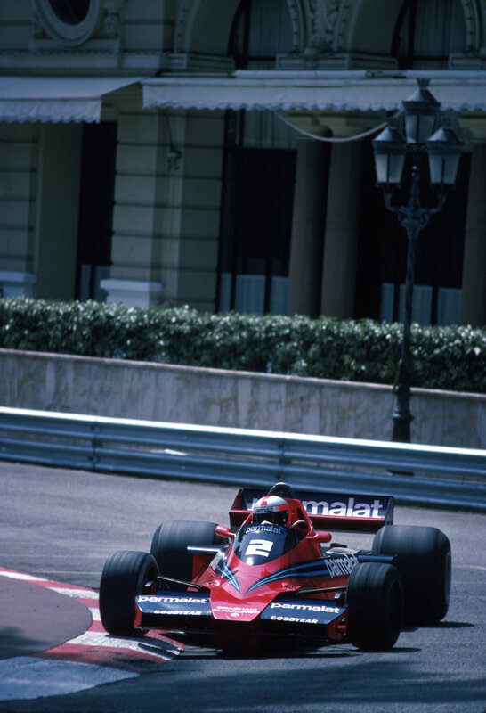 Red race car on track