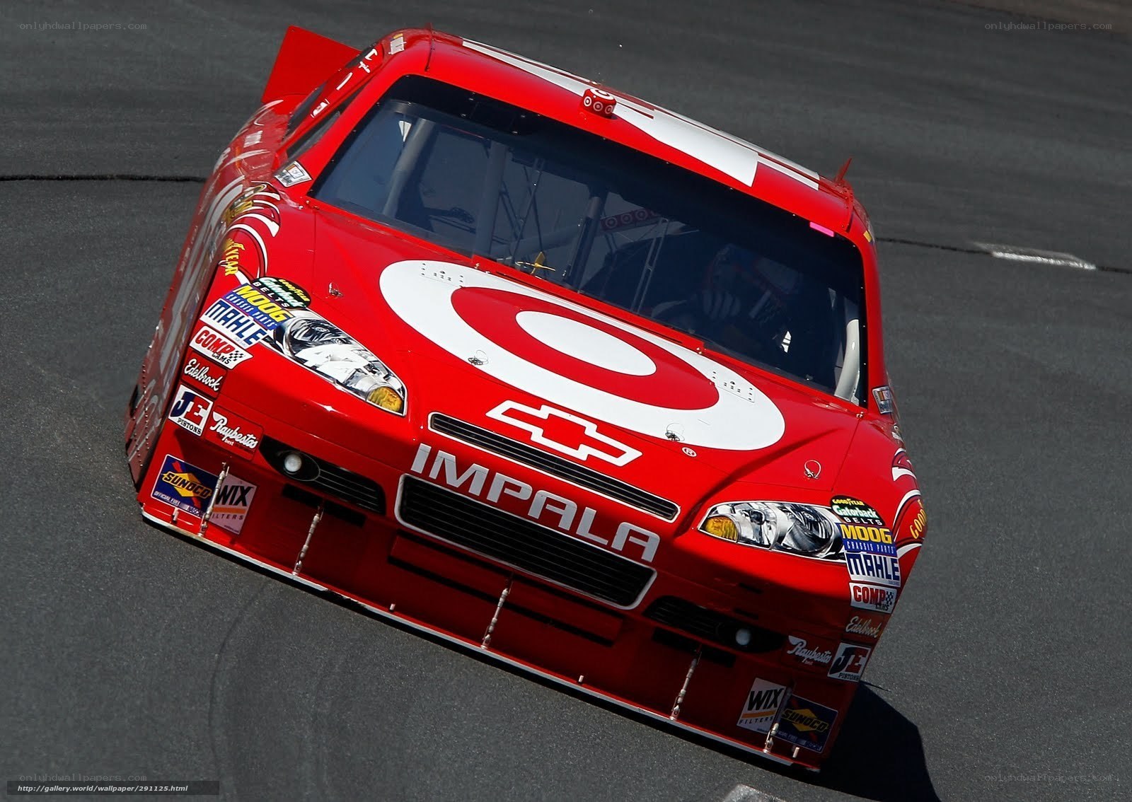 Red race car on track