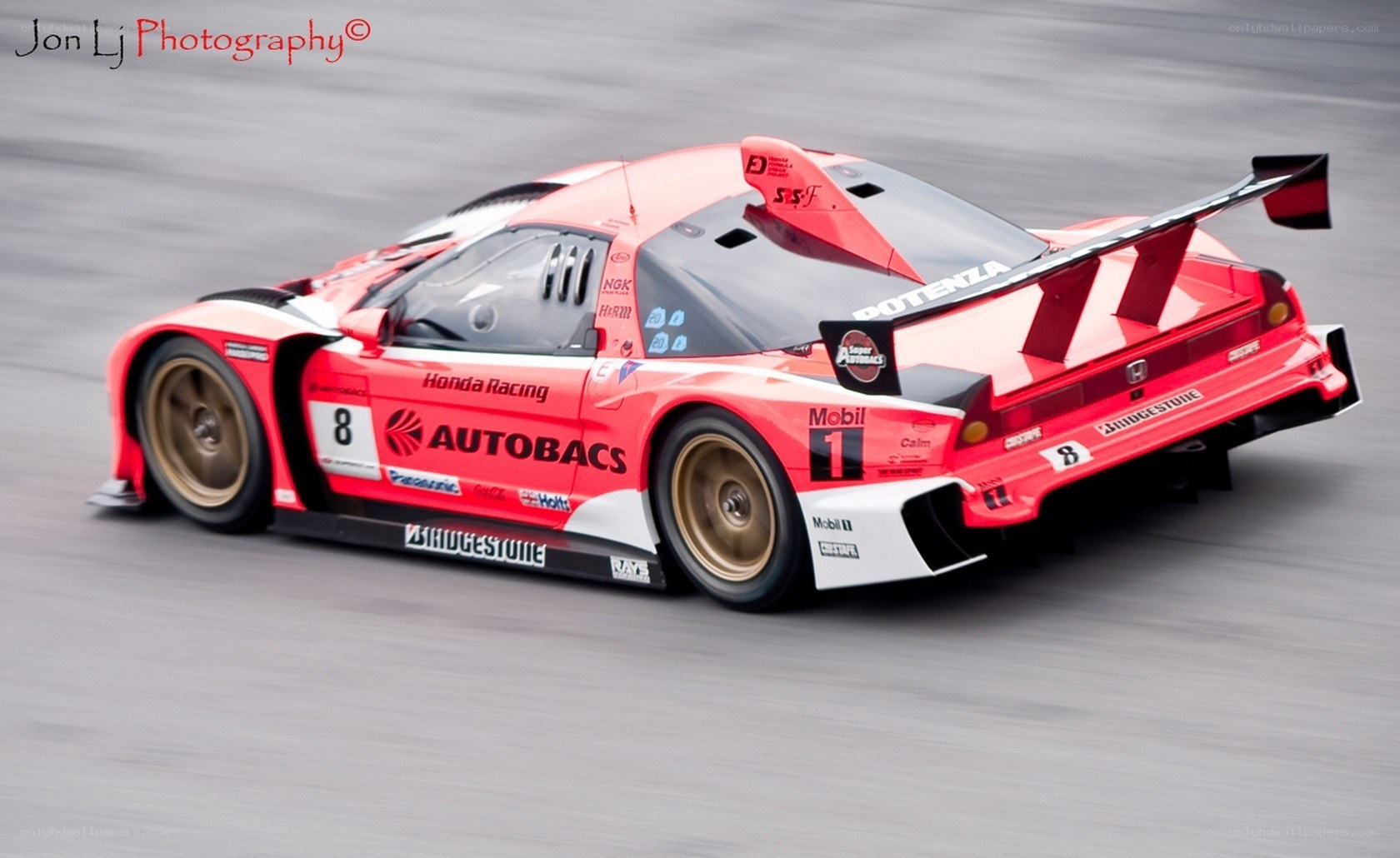 red race car on track