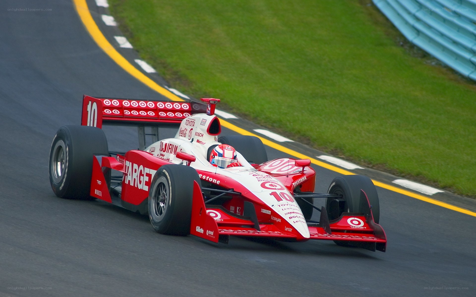 Red race car on track