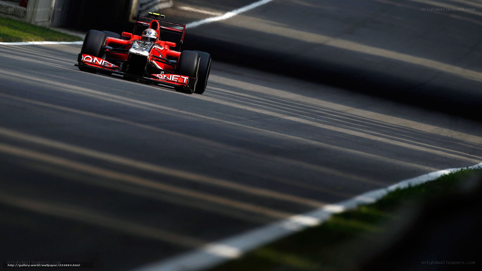 Red race car on track