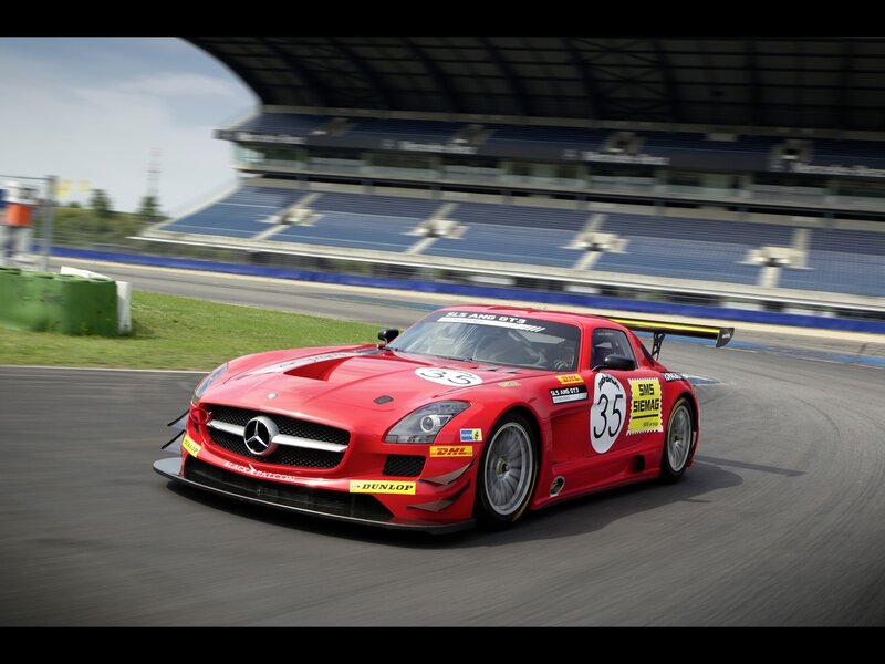 Red race car on track