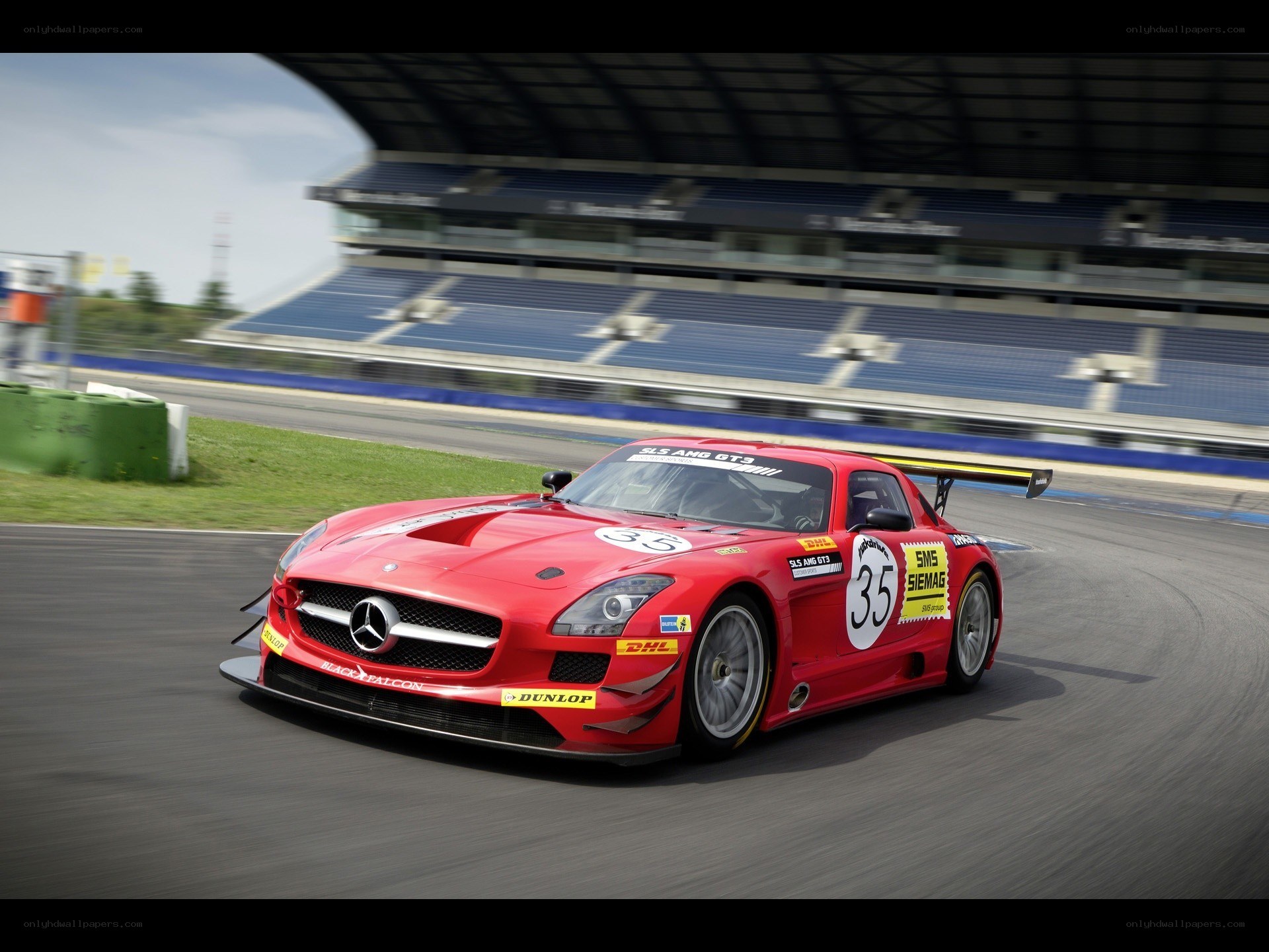 Red race car on track