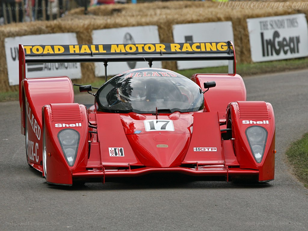 Red race car on track