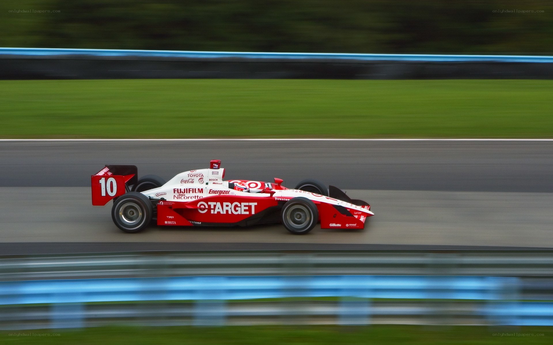 Red race car on track