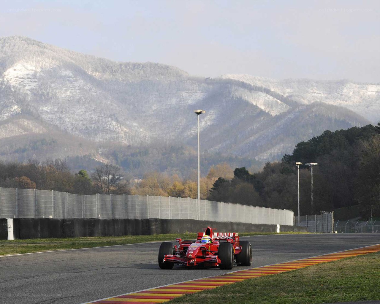 Red race car on track