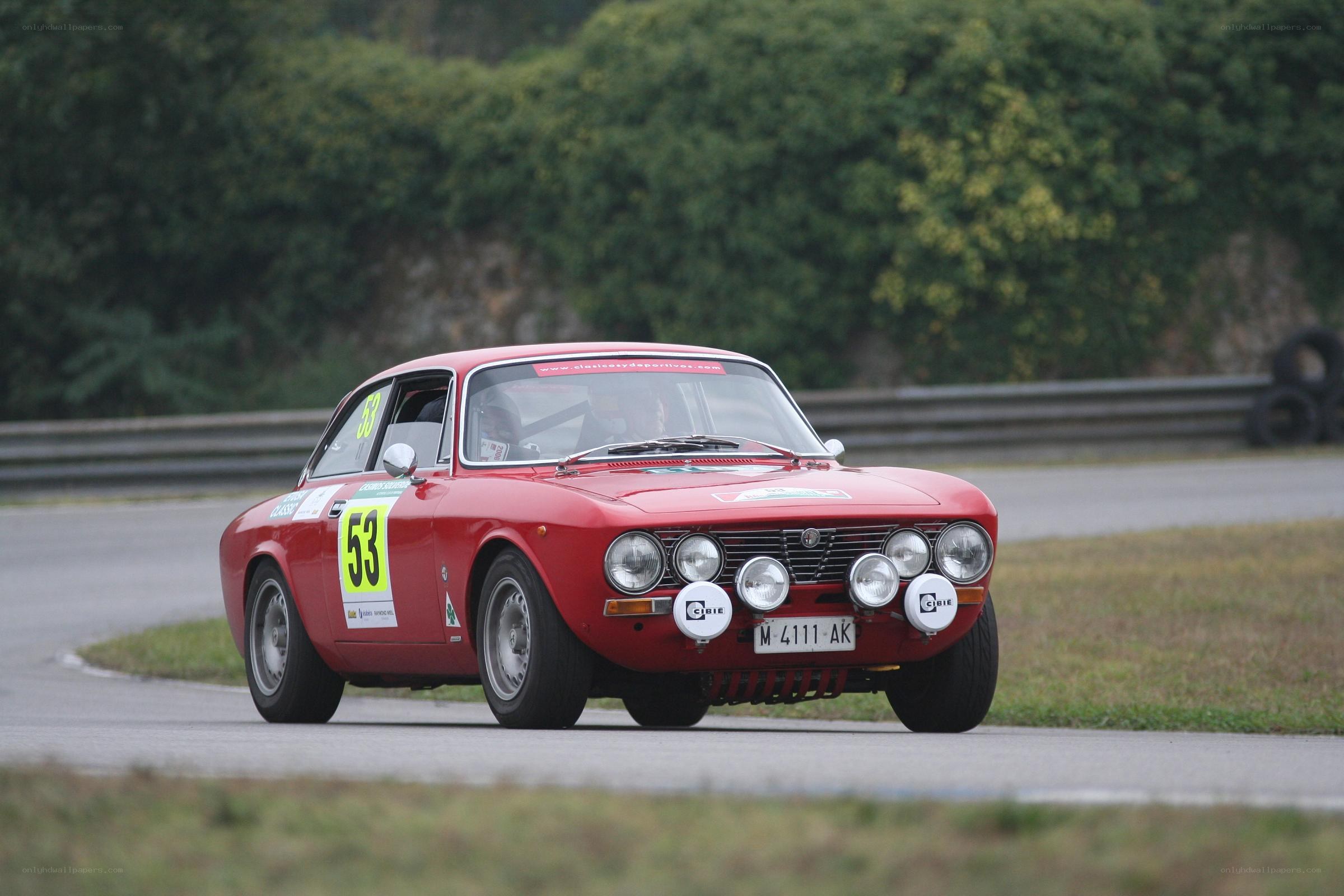 Red race car on track