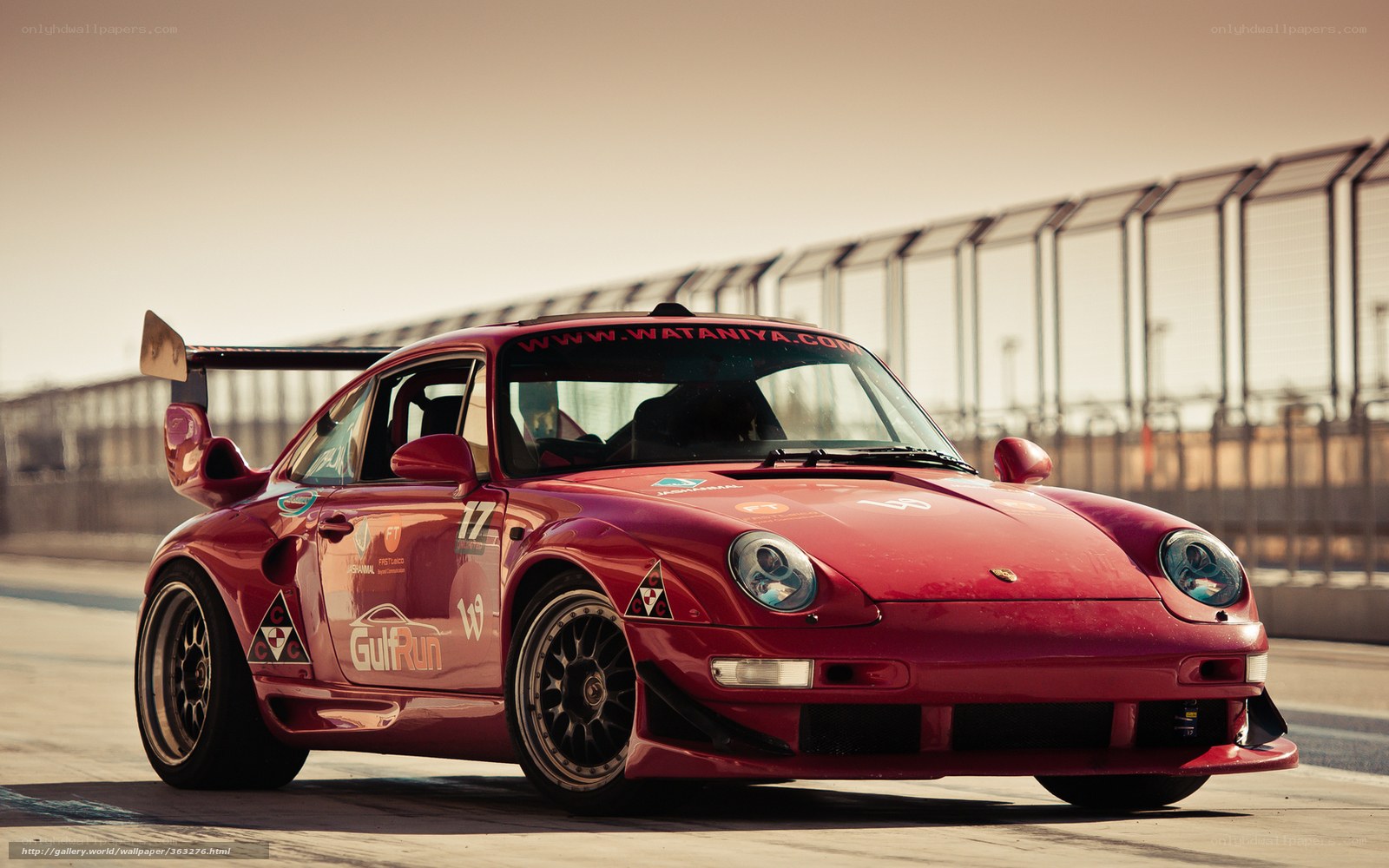 red race car on track