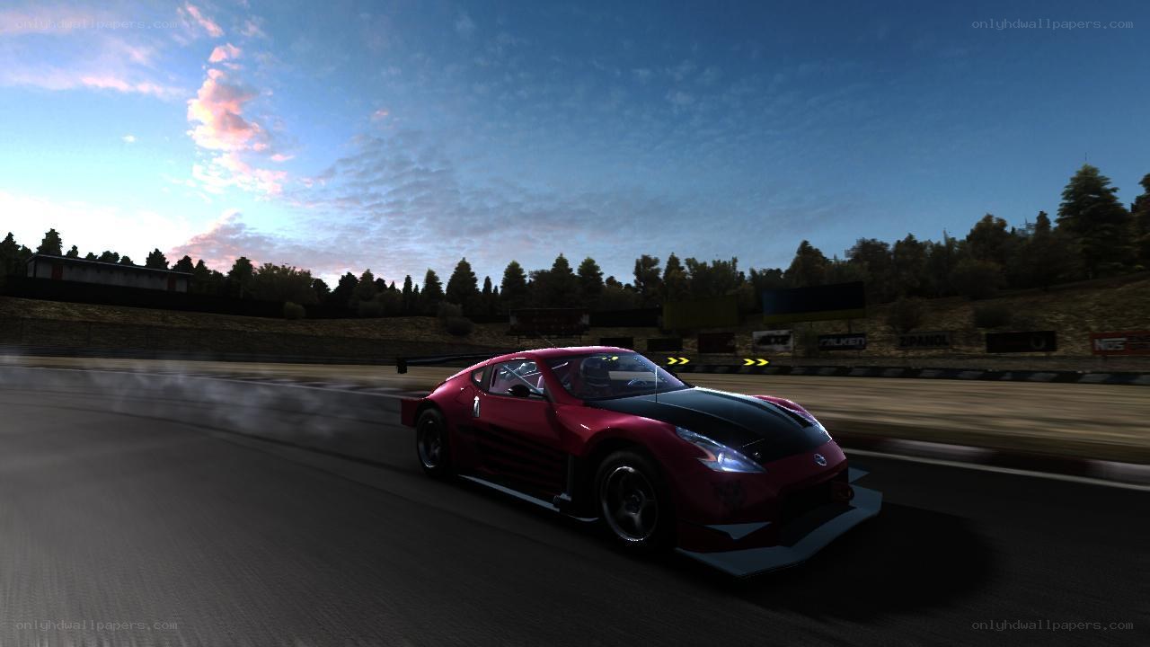 Red race car on track